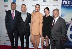 Consul General of Israel in Los Angeles Israel Bachar, from left, Ynon Kreiz, Gal Gadot, Tom Nesher, and Meir Fenigstein at The 36th ISRAEL FILM FESTIVAL in Los Angeles Gala Opening Night and Premiere Screening of Come Closer at Saban Theater, on Wednesday, Nov 13th, 2024 in Los Angeles.